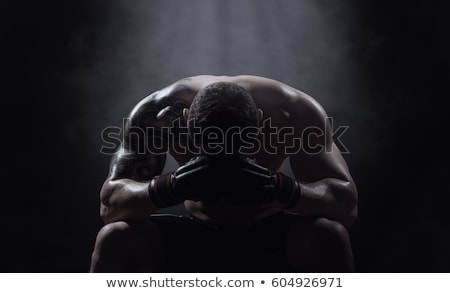 Stock photo: Fighter On Black Background