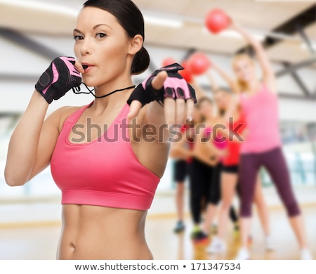 Foto stock: Sporty Woman With A Whistle