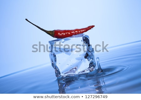 Stock foto: Ice Cube And Red Peppers