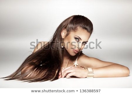 Woman Wearing Gold Earrings And Bracelet Stockfoto © PawelSierakowski