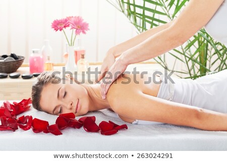 Stock photo: Beautiful Spa Woman Lying Down With Red Rose