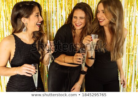 Foto stock: Wine Glasses Over Pretty Girls Background