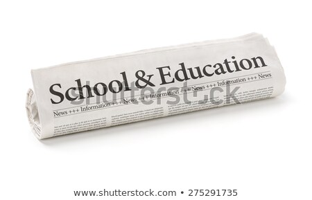 [[stock_photo]]: Rolled Newspaper With The Headline School And Education