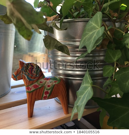 Foto stock: Carved Wooden Soldier And Horse