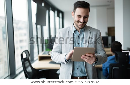 Stok fotoğraf: Smiling Young Businessman Dressed In Shirt