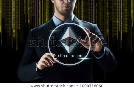 Сток-фото: Businessman With Ethereum Over Binary Code