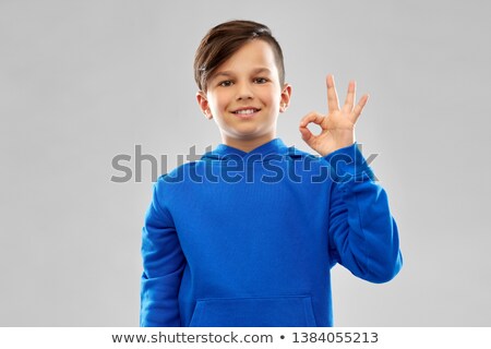 Stock photo: Boy In Blue Hoodie Showing Ok Hand Sign