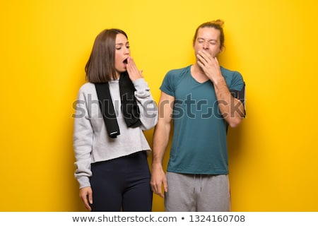 ストックフォト: Young Couple Yawning