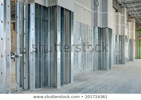 Foto stock: Drywall And Framing In Construction Site