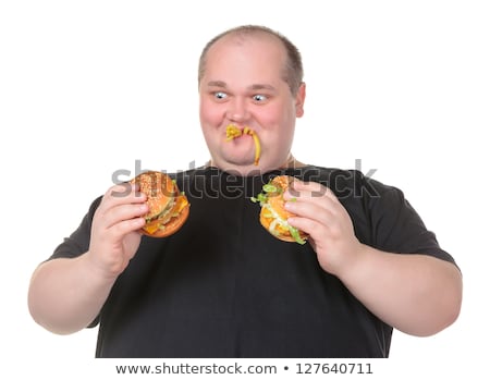 Stock fotó: Fat Man Looks Lustfully At A Burger