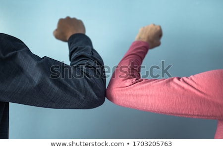 Foto stock: Casual Man With Hand On Other Elbow