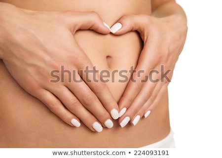 Stockfoto: Pregnant Woman With Hands Forming Heart Shape