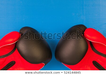 Stock fotó: Red And Black Boxing Gloves On A Blue Wooden Table