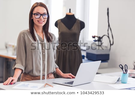 ストックフォト: Fashion Designer Woman Working On Her Designs In The Studio