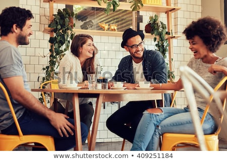 Foto stock: Group Of Happy Young Friends Having Fun Time Together