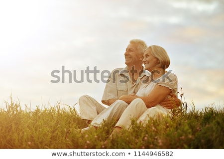 Foto stock: Couple In Garden During Summer