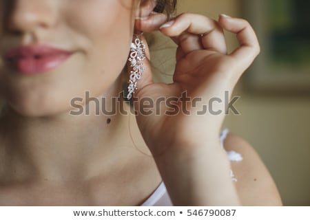 Stock foto: Woman Wearing Shiny Diamond Earrings