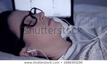 Stockfoto: Girl Lying On The Bed With Laptop