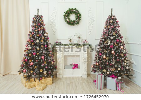 Stockfoto: Golden Reindeer Near Christmas Decorations