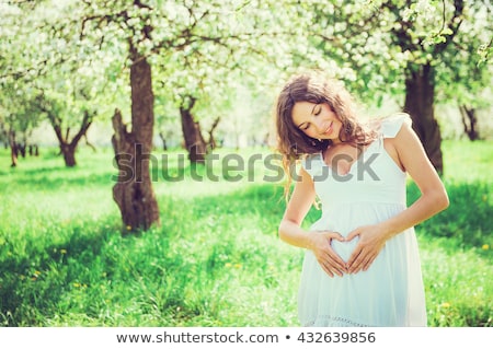[[stock_photo]]: Flower Garden Orchard Pregnant Woman