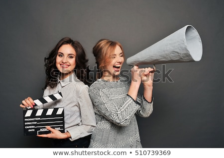 Stok fotoğraf: Two Women Inform About The Beginning Of Shooting