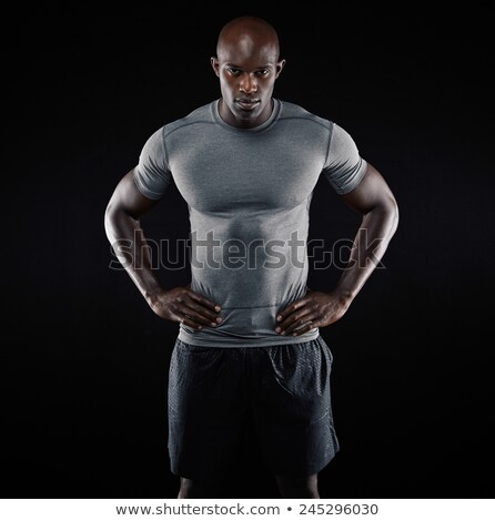 Stock fotó: Portrait Of A Male Athlete Muscular On Black