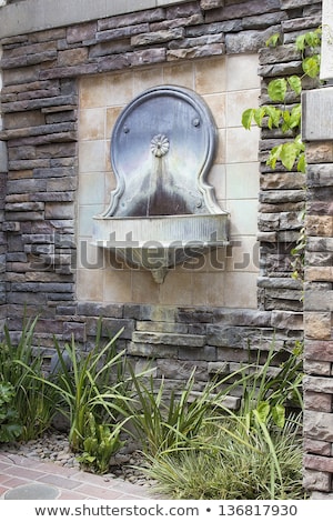 ストックフォト: Tuscan Style Wall Water Fountain In Courtyard