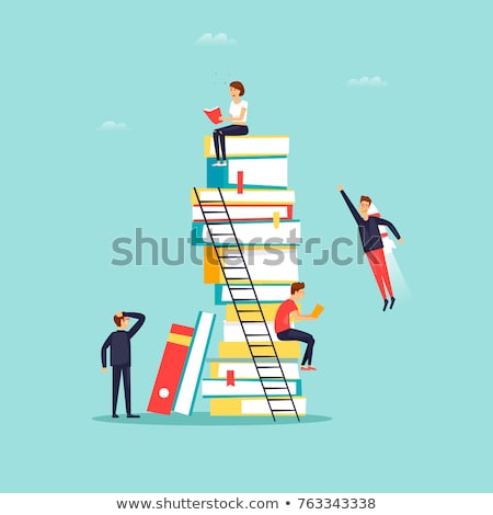 Stock photo: Man Sitting On Stack Of Books