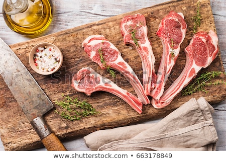 Stock fotó: Raw Lamb Chop On Chopping Board