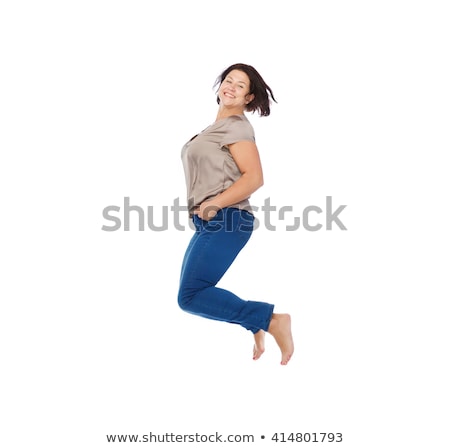 Stock photo: Smiling Happy Plus Size Woman Jumping High In Air