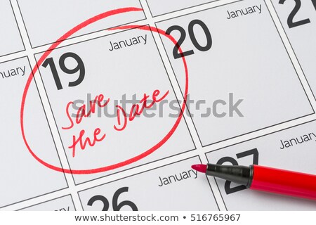 Stok fotoğraf: Save The Date Written On A Calendar - January 19