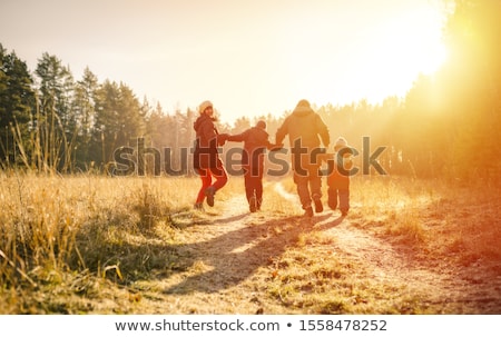 ストックフォト: Woman Running In The Coutryside In Winter Or Autumn