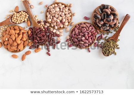 Foto stock: Assortment Of Lentils In A Wooden Bowls With Copy Space On White Wood Background Top View Closeup