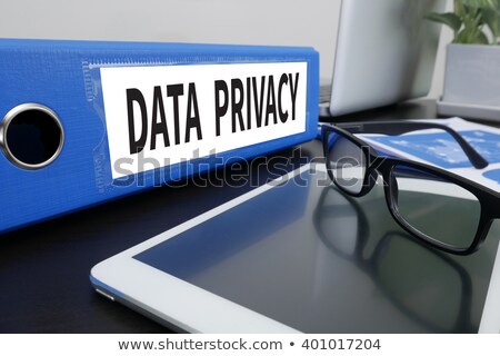 [[stock_photo]]: Data Privacy On Laptop In Modern Workplace Background