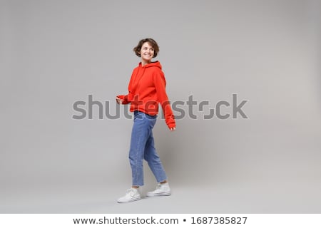 Zdjęcia stock: Full Length Portrait Of A Young Smiling Woman