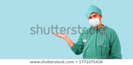 Stockfoto: Nurse In Facemask In Operating Room