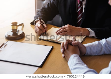 Stock photo: Close Up Of Gavel Male Lawyer Or Judge Working With Law Books