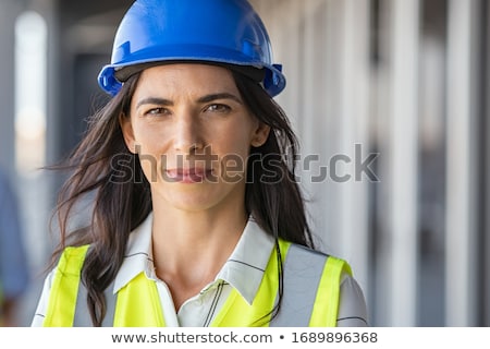 [[stock_photo]]: Businesswoman And Construction Worker