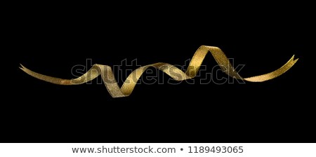 Stok fotoğraf: Golden Bow On A Ribbon With Black Background