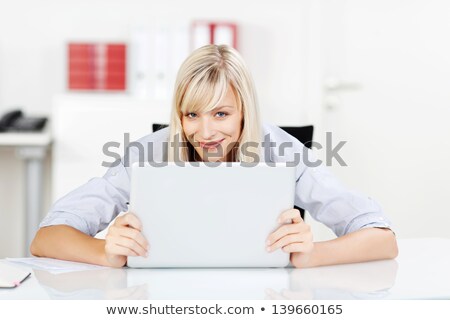 Stock fotó: Attractive Young Businesswoman Crouching With Laptop