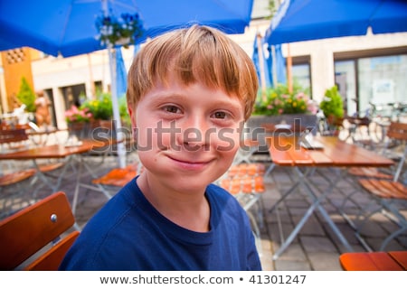 Сток-фото: Happy Child Smiles With Full Mouth And Looks Boldfaced And Laugh