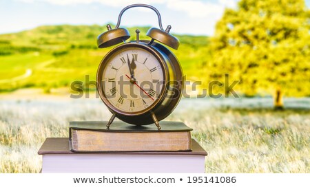 Foto stock: Clock And Bible Front Of Monitor