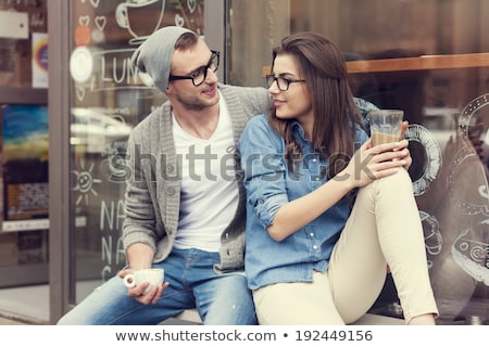 Foto stock: Young Urban Man Relaxing With Legs Crossed