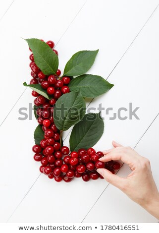Foto stock: Woman L With Cherry