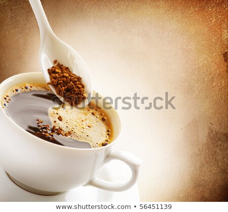 [[stock_photo]]: Brown Pieces Of Instant Coffee On White