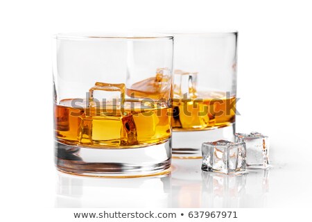 Foto stock: Whiskey Glasses With Ice Cubes Isolated On White Background