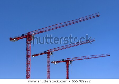 Stock photo: Building Construction Site - Crane Hook Against Blue Sky