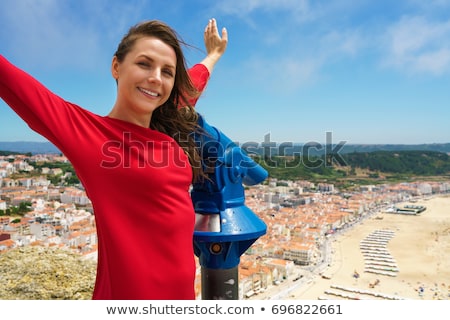 Сток-фото: Beautiful Woman Using Coin Paid Binoculars On High Hill And Look