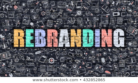 Stockfoto: Rebranding Concept Multicolor On Dark Brickwall