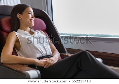 Happy Commuter Enjoying Train Travel To Go To Work In The Morning Asian Woman Enjoying View Passing Stockfoto © Maridav